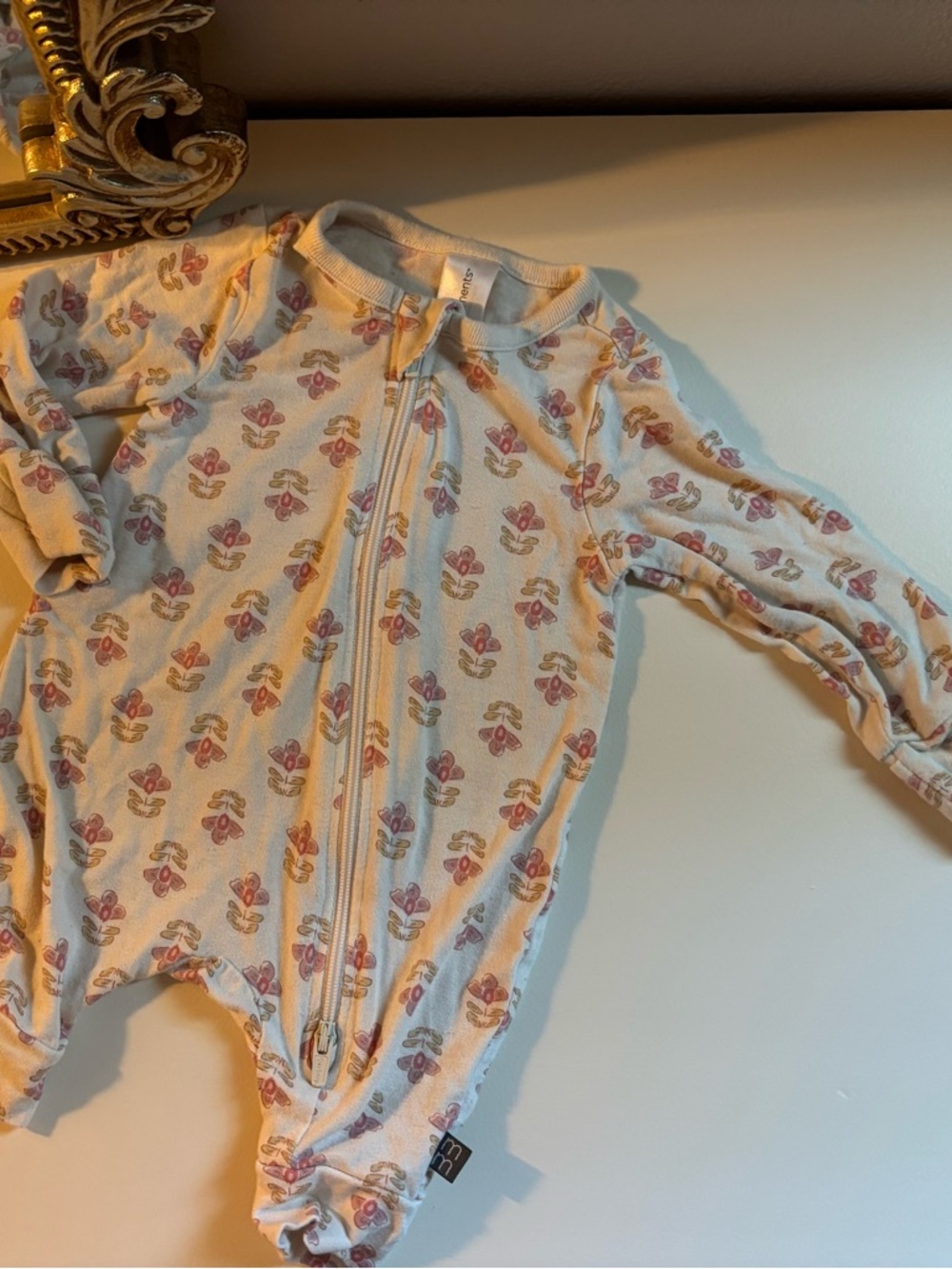 mod&co by Gerber Neutral Floral Newborn Zip Footie
